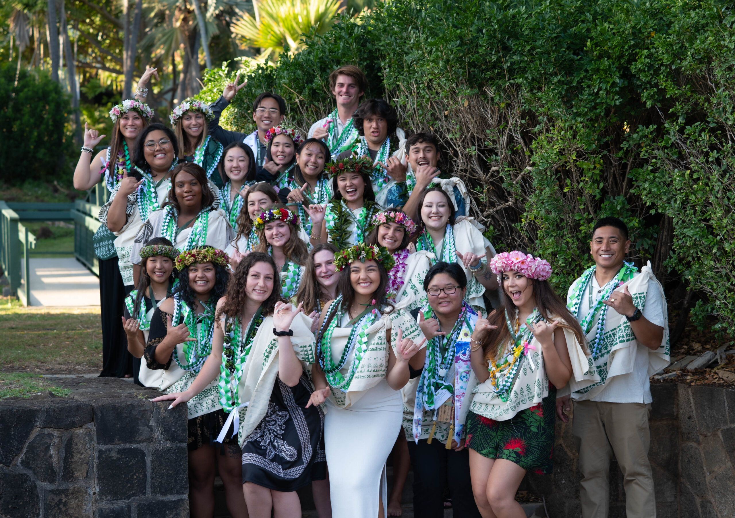 group photo wearing lei