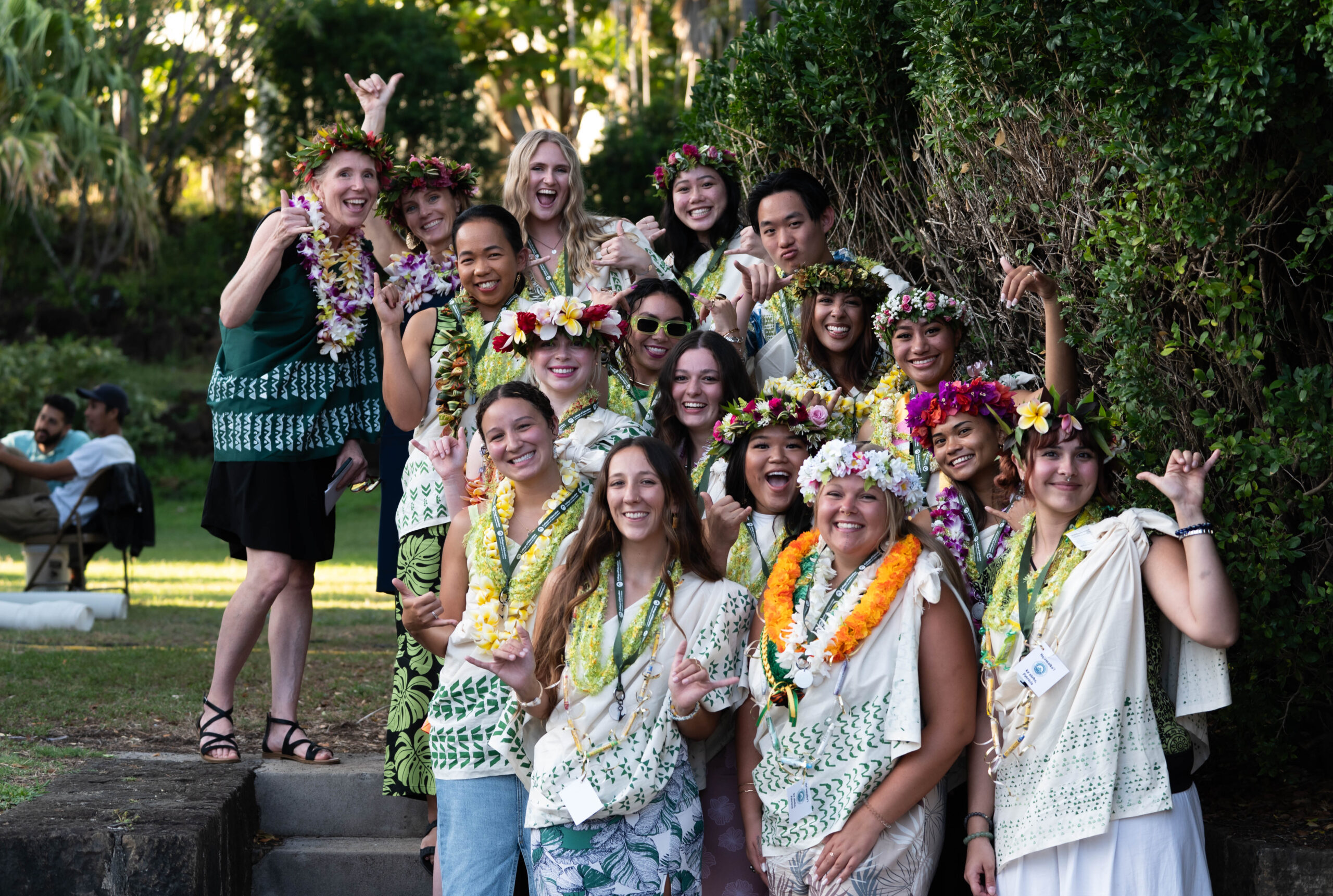 group photo wearing leis and kihei