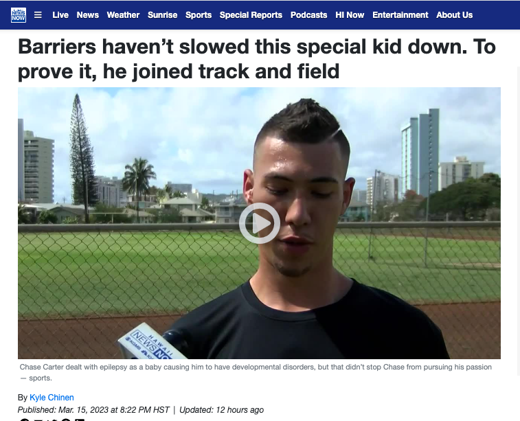 Chase talking to reporters at the Kaimuki High School Track.