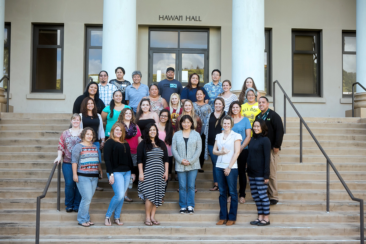 MEd SPED graduates standing on the stairs in front of Hawaii Hall on the Uh Manoa campus