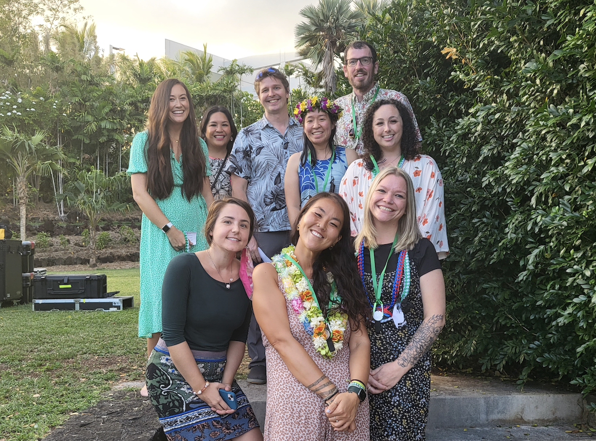 MEd SPED Graduates and faculty standing together smiling for a photo at the College of Education convocation