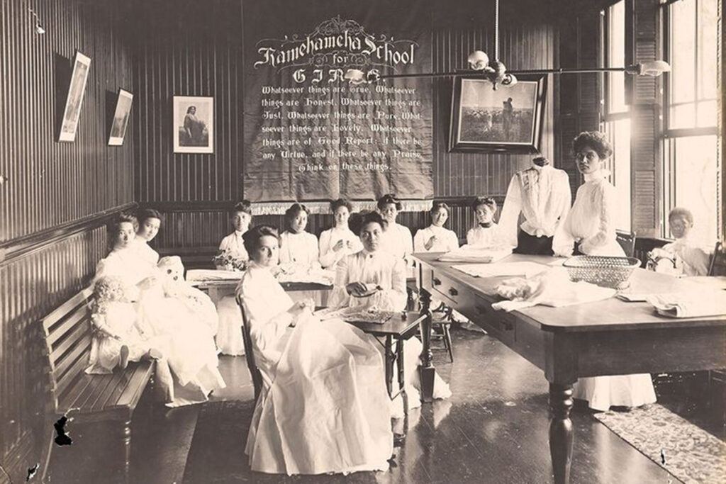 Women in dresses at Kamehameha School