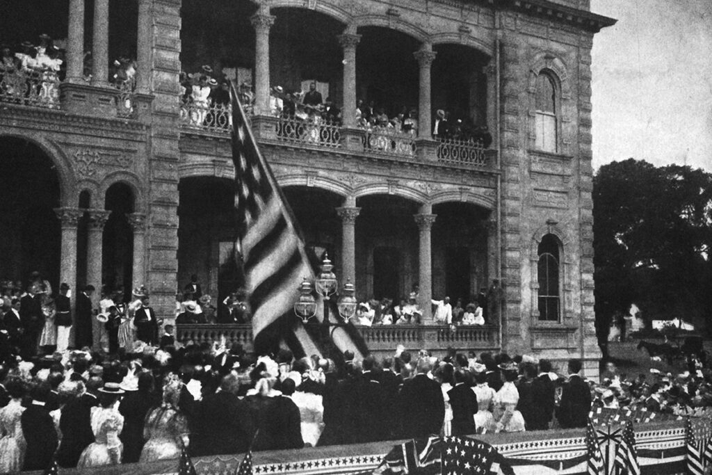 raising American flag at Iolani Palace
