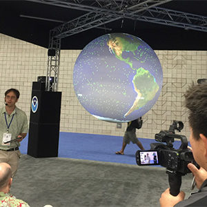 LTEC student giving presentation using 3D globe